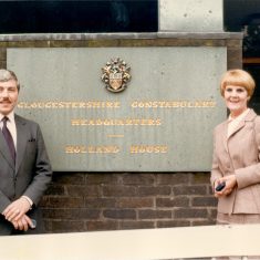 Detective Sergeant R. Hall and Detective Sergeant M. Hall at front of Police Headquarters - first husband and wife team in Gloucestershire to receive Police Long Service and Good Conduct medals. (Gloucestershire Police Archives URN 416)