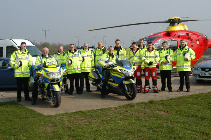 This was the last duty day for Police Constable Paul Thomas, a Paramedic before he joined the Gloucestershire Constabulary, before he emigrated to Australia, to serve in Perth, Western Australia. Left to right; Police Constables Lloyd Birch, Martyn Hillier on a BMW R1150RT, Martin Gardner, Ben Smith, Police Sergeants Andy Evans andJohn Bunce, Police Constable Paul Thomas (on the Honda ST1300) three unknown air crew, Police Constable Tony Wallace at the back and Police Constables Andy Baker & Bill Jenkins. (Gloucestershire Police Archives URN 2171)  | Photograph from Martyn Hillier