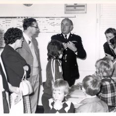 Police Open Day at Headquarters 1979 showing Chief Inspector M. Howell and members of public in Force Information Room. (Gloucestershire Police Archives URN 266) 