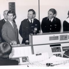 His Royal Highness Prince of Wales and Lady Diana Spencer with Senior Officers in Police Headquarters Information Room. From the left Chief Constable L.A.G. Soper, Chief Inspector Mel Howells, Superintendent Reg Johnson, Assistant Chief Constable Louis Whitton. (Gloucestershire Police Archives URN 328) 