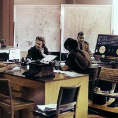 Force Control Room 1960s. Dave Thompson facing the camera on the right. (Gloucestershire Police Archives URN 10959)